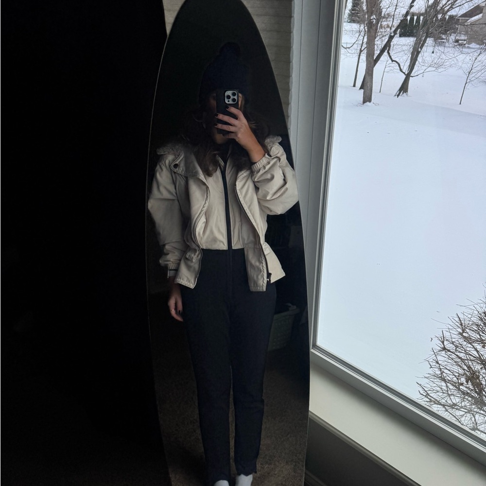 NILS Cream Puffer Jacket with Gray Sherpa Collar and Black Pants